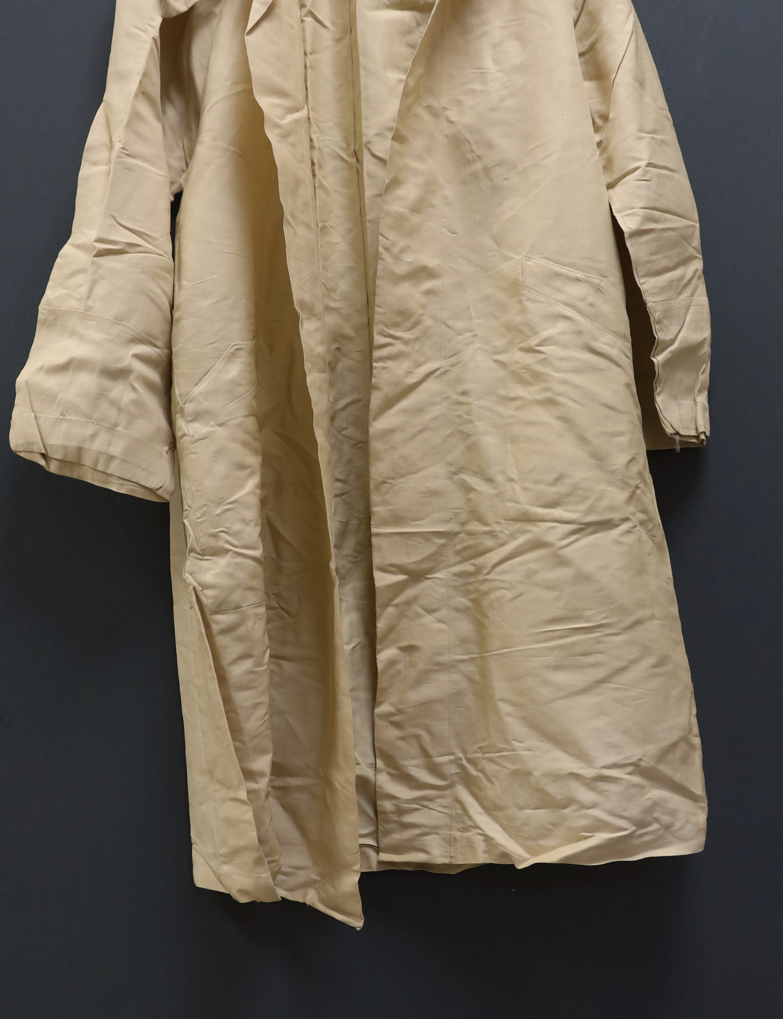 A ladies 20th century cream shantung silk summer duster coat